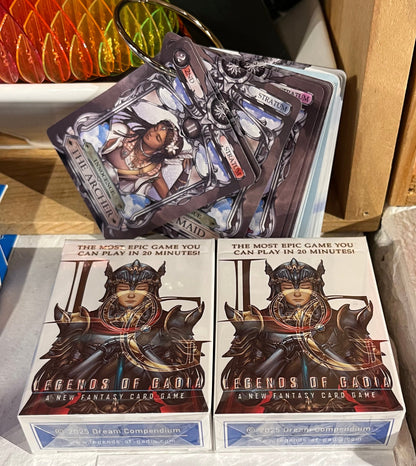 Two boxes of 'Legends of Gadia Fantasy Card Game' with game cards on top.